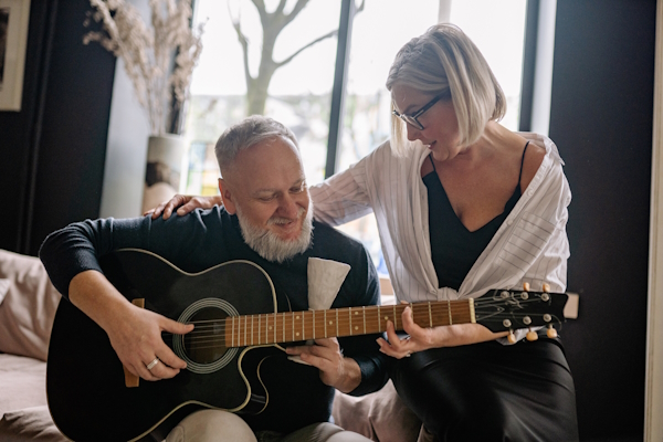 Adult Guitar Lessons playing guitar